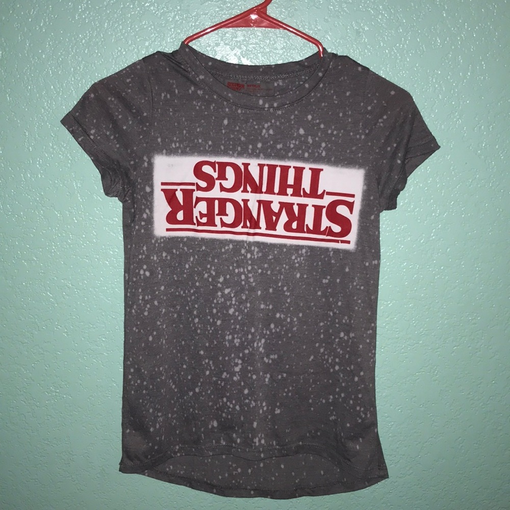 Stranger things shirt.